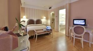 TV a/nebo společenská místnost v ubytování Bonotto Hotel Belvedere