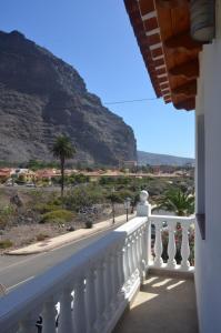 a white balcony with a view of a mountain at Casa Antonio in Valle Gran Rey