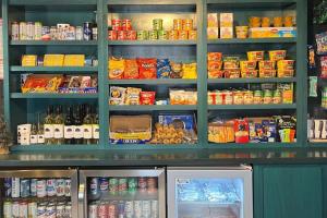 a grocery store filled with lots of food and drinks at Alliance Hotel & Suites, a Howard Johnson by Wyndham in Alliance