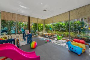 a childrens play room with a large window at Blue Bay Resort - Access to Pool and Beach-Phuket & Krabi in Ko Yao Yai