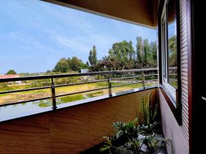 a view from the balcony of a house at Hotel GVS Residency in Yercaud