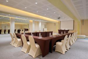 a large conference room with a long table and chairs at Marni Pattaya in Pattaya South +62 photos