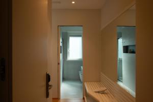 a bathroom with a toilet and a window at Le Ciulla Luxury B&B in Pescara +30 photos