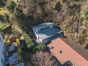 an overhead view of a house with a roof at La Roche & Le Lac in Sévrier