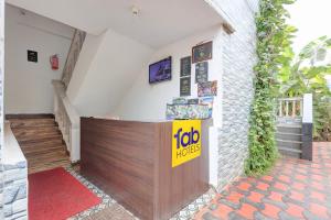 a lobby of a house with a reception counter at FabHotel Crystal Bay Baga in Baga