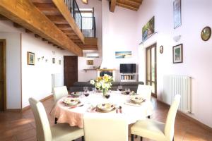 a dining room with a table and chairs at Casamorena in Montegabbione +25 photos