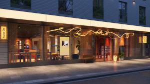 a store front of a building at night at Scandic Go, Saaristonkatu 1 in Oulu
