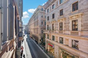 a view of a street in a city with buildings at The Couper Umiltà in Rome