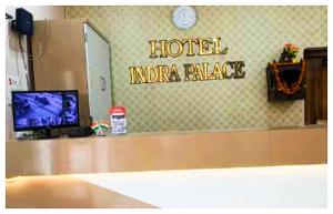 a hotel information sign on the wall of a room at Hotel Indra Palace Jaunpur in Jaunpur +19 photos
