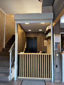 an entrance to a building with stairs and a lobby at Hotel NIU a 50 m del Funicamp in Encamp