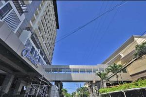 a view of a building from the street at Sweet Escape 22 at O Residences in Bacolod