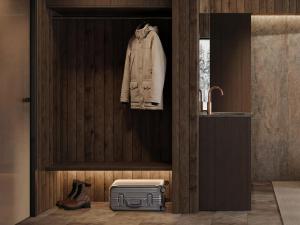 a coat hanging on a wall in a bathroom at Halo Igloos Resort in Rovaniemi