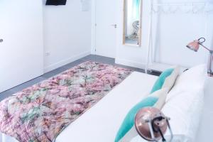 Postel nebo postele na pokoji v ubytování Hostal La Casa Sanlúcar
