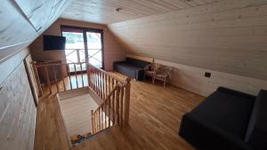 an overhead view of a room in a cabin at Ramaus poilsio sodyba in Petruniškis