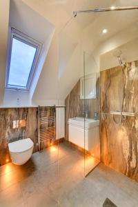 a bathroom with a shower and a toilet and a sink at 5 Bed in Walmer oc-do022 in Kingsdown +38 photos