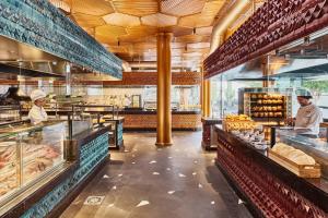 two chefs are working in a kitchen in a bakery at Seaside Los Jameos in Puerto del Carmen