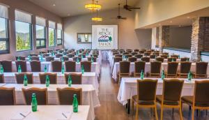 a conference room with tables and chairs with green bottles on them at Holiday Inn Club Vacations - Tahoe Ridge Resort in Stateline +112 photos