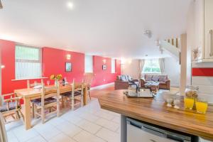 a kitchen and living room with a table and chairs at 2 Bed in Sledmere oc-ey103 in Sledmere