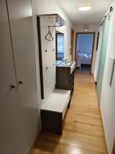 a bathroom with a sink and a mirror at Alpenblick in Trofaiach