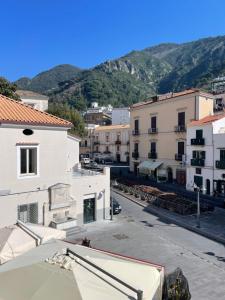 a view of a city with buildings and mountains at Casa Mariannina in Maiori
