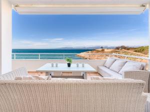 a living room with a view of the ocean at Apartment Rits-1 by Interhome in Salou