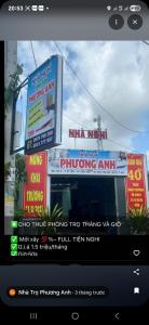 a television screen with avertisement at Home 100k in Vị Thanh