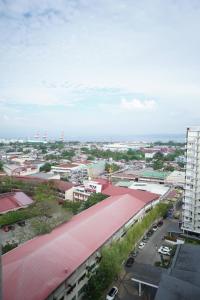 an overhead view of a city with a red roof at The Storeys - Mesaverte Residences CDO in Pontud