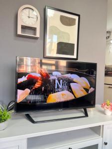 a flat screen tv sitting on top of a table at ヴィオラ菊水 in Sapporo