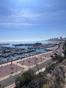 a view of a marina with a bunch of boats at Beach Apartament Playa in El Campello