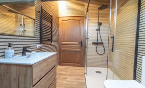 a bathroom with a sink and a shower at el Niuet All in All +15 photos