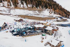 an aerial view of a ski resort in the snow at Super G in Courmayeur