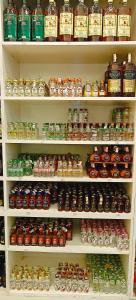 a store shelf filled with lots of food and drinks at Sukra Residency in Valavanūr