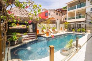 an image of a swimming pool in a house at Pousada Mareia in Morro de São Paulo