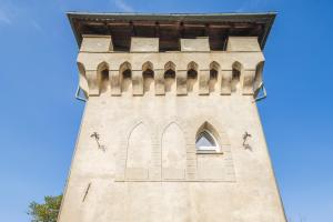 a clock tower with the number eight on it at Torre Dell'Amore, Genova, Seaview in Genoa