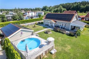 an aerial view of a house with a swimming pool at Luxury villa with pool in Bro