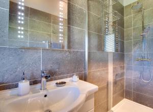 a bathroom with a sink and a shower at 4 Bed in Alston oc-nb575 in Alston +22 photos