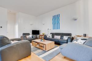 a living room with couches and a coffee table at 2 Bed in Embleton oc-nb1960 in Embleton