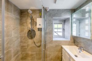 a bathroom with a shower and a sink at 1 Bed in Cerrigydrudion oc-bow194 in Cerrig-y-Druidion
