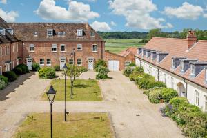 an aerial view of a row of brick buildings at 2 Bed in Blythburgh oc-t27735 in Blyford