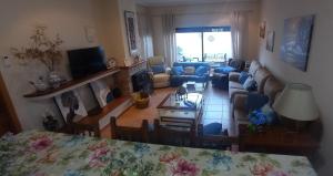 a living room with a couch and a table at Casa Rural La Gospa in Urda