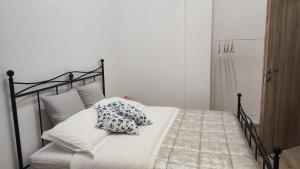 a bed with two pillows on it in a bedroom at Torino Comfort 10 in Turin