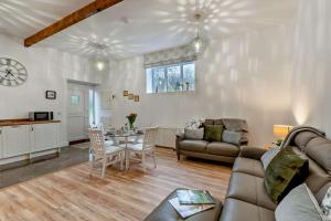 a living room with a couch and a table at 2 Bed in Shotley Bridge oc-h29037 in Shotley Bridge