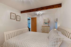 a bedroom with a white bed and a wooden ceiling at 2 Bed in Shotley Bridge oc-h29037 in Shotley Bridge