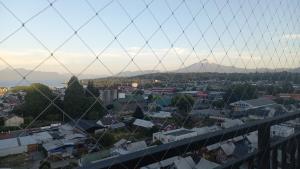 a view of a city from a suspension bridge at Vista Insuperable in Villarrica +6 photos
