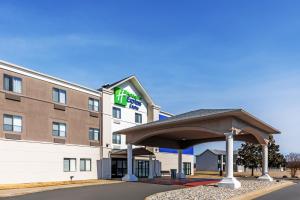 a hotel building with a gazebo in front of it at Holiday Inn Express Hotel & Suites Lonoke I-40 by IHG in Lonoke