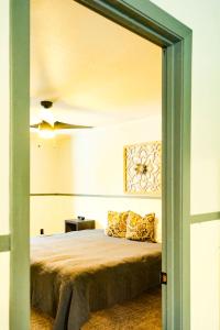 a bedroom with a bed and a ceiling at Charming Ski Chalet at Powderhorn Mountain in Bessemer