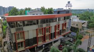 an overhead view of a building in a city at AS Suites in Cochin