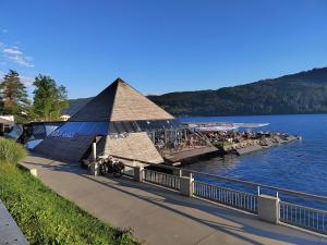 a group of people on a dock on a lake at Lake View in Millstatt