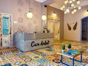 a store with a counter and a tile floor at Casa Avelina Boutique Hostel in Santa Marta