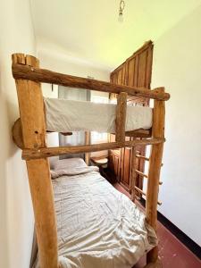 a couple of bunk beds in a room at Nguruma house of travellers and tours in Arusha